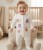 Чоловічок Kids Wear «Квіточки» молочний, дівчинка 0-3-6 місяців, фото